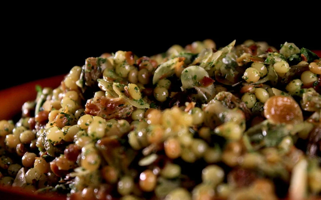 Pearl couscous with raisins and almonds