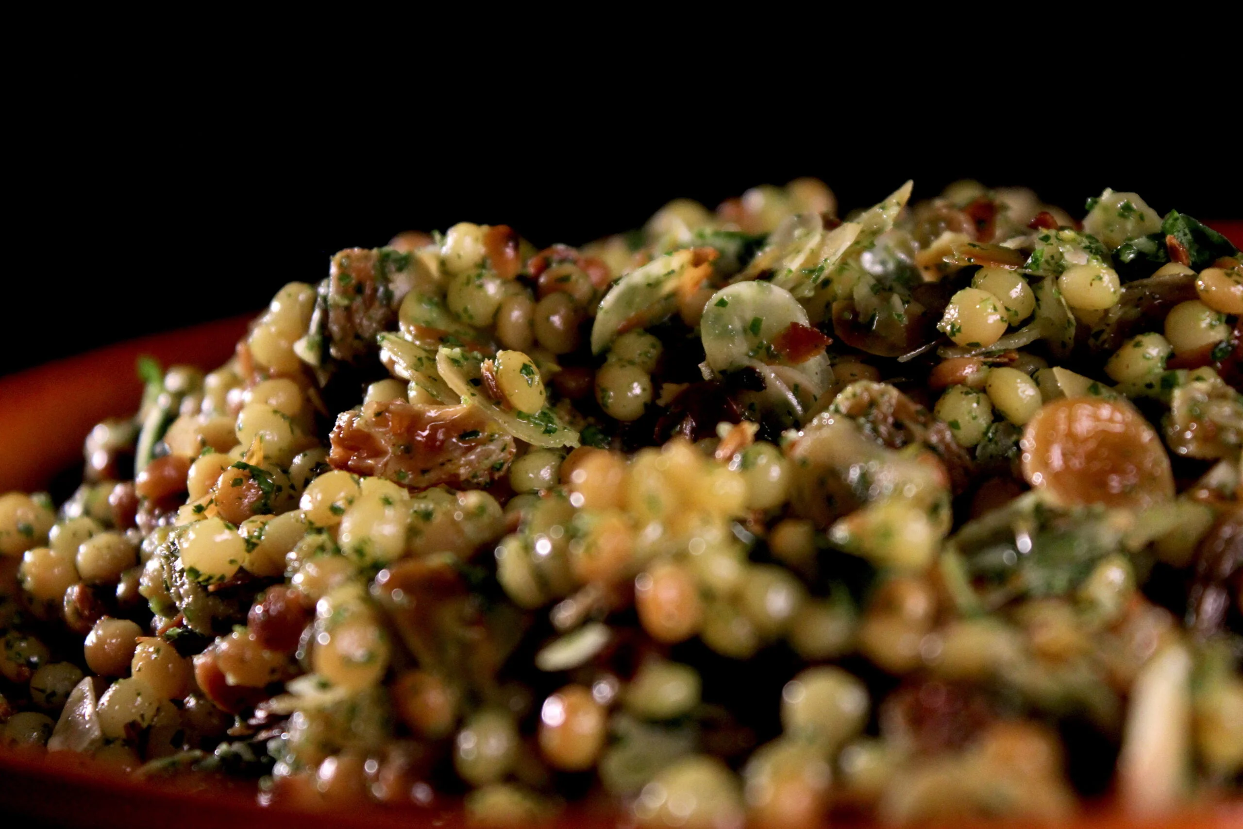 Pearl couscous with raisins and almonds