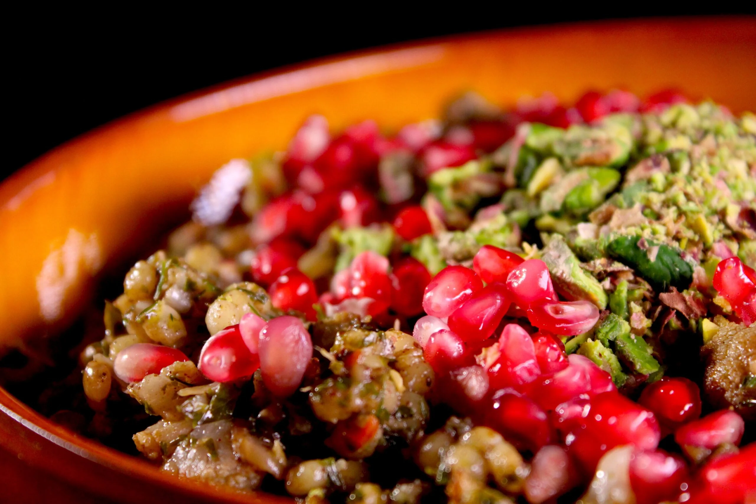 Parelcouscous met bloemkool, pistache en granaatappel