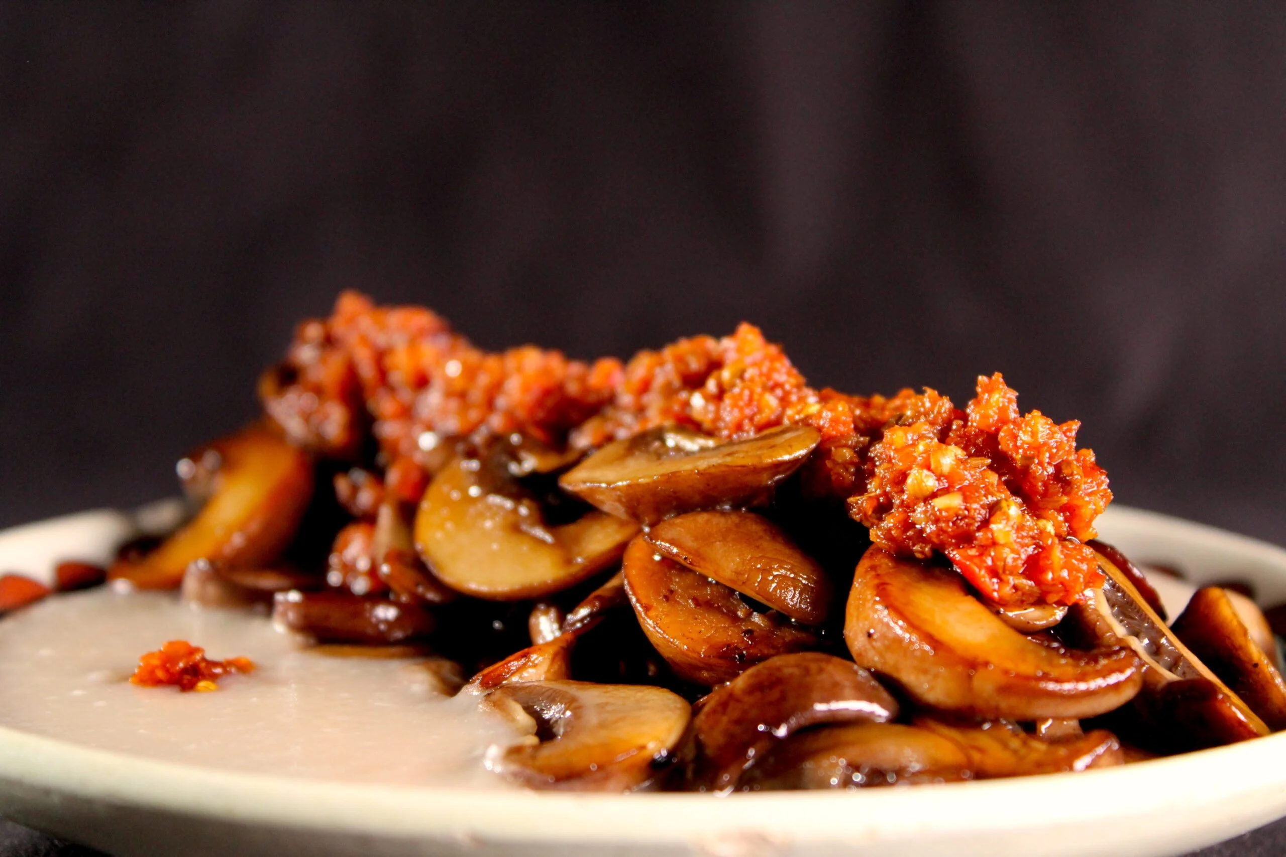 Mushrooms, lima bean puree and spicy tomato paste