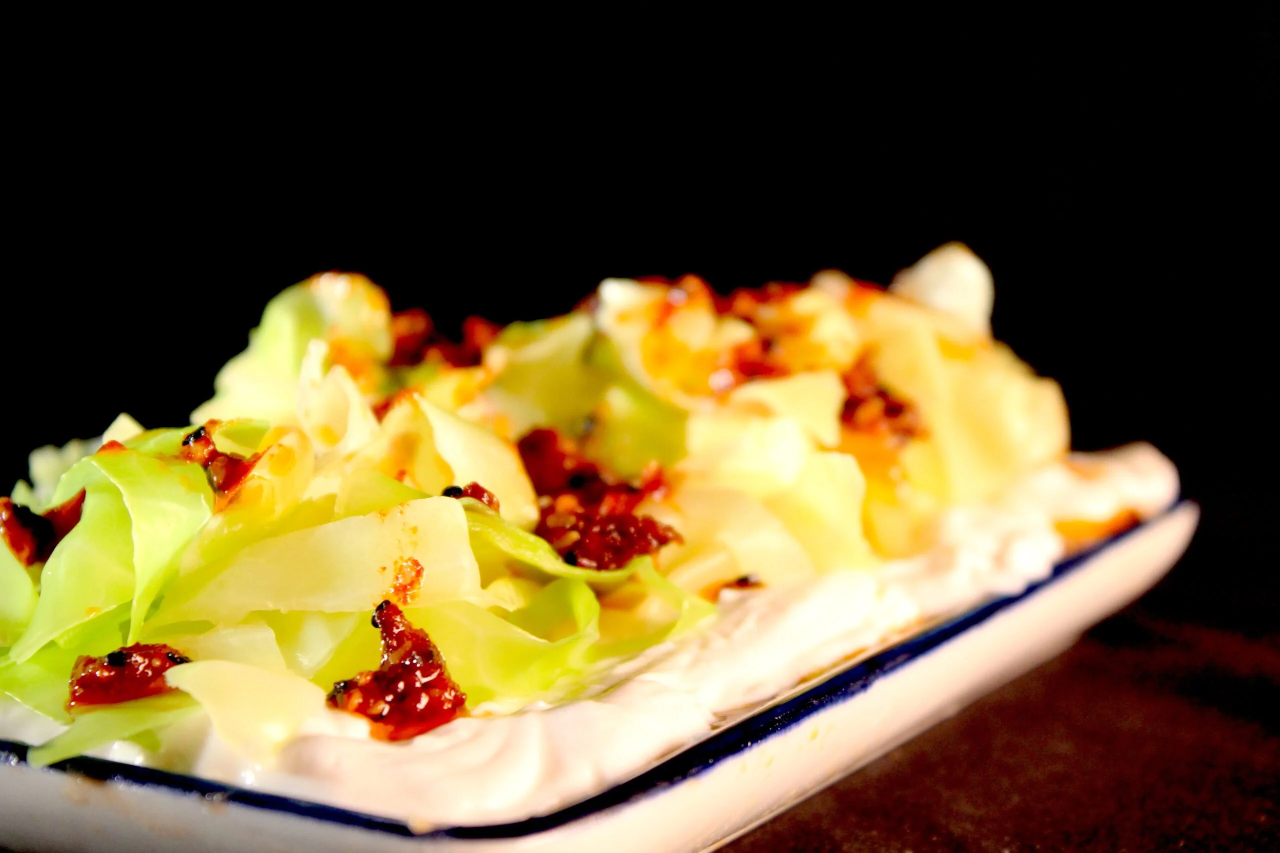 Oxheart cabbage with ginger cream and dragon oil