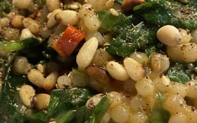 Pearl couscous with spinach and sun-dried tomatoes