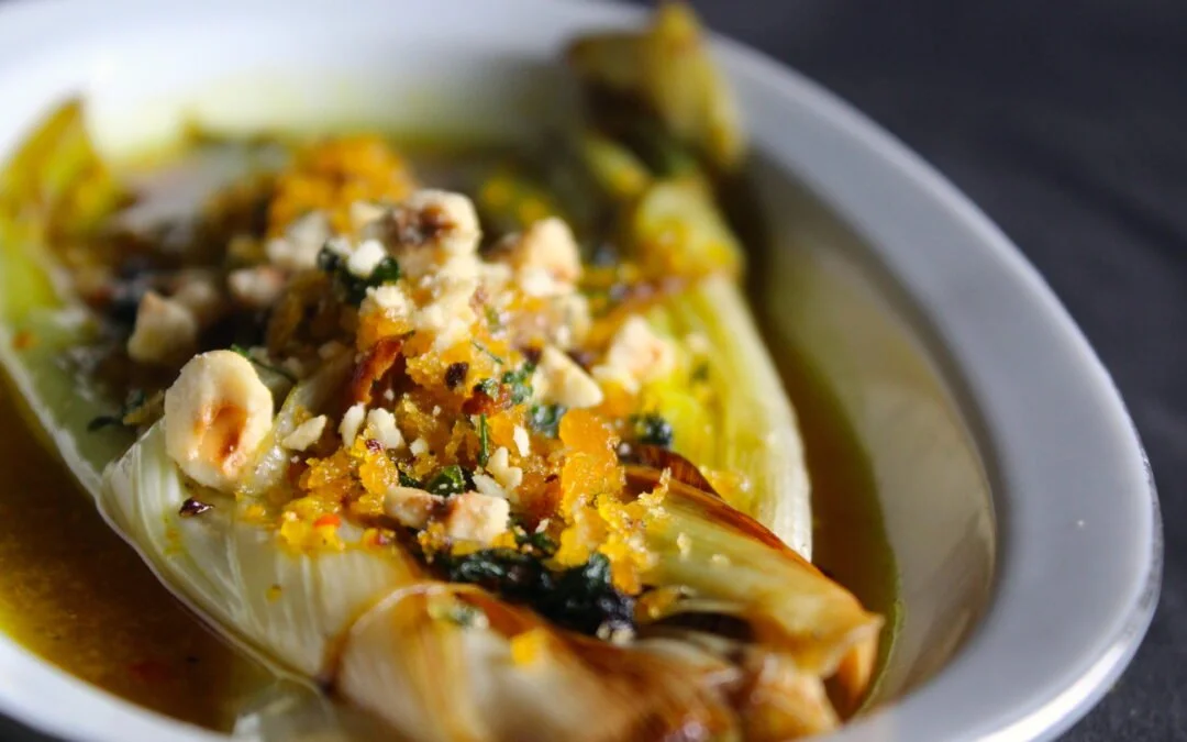 Leek from the oven in saffron vinaigrette and spicy crumb