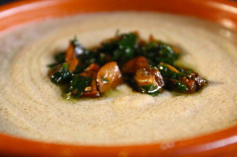 Creamy mushroom soup with tahina and ouzo or arak