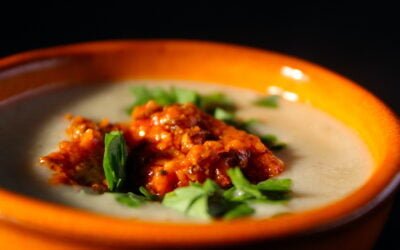 Creamy garlic soup with harissa