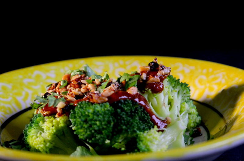 Broccoli with a slightly spicy gochujan sauce and caramelized peanuts
