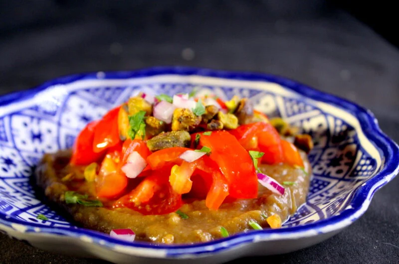 Tomato salad on eggplant puree with tamarind