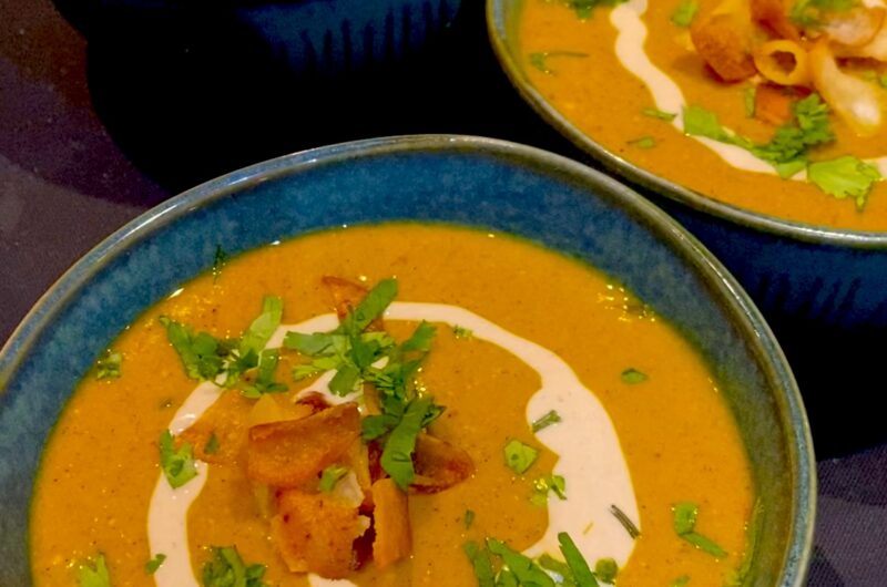 Lebanese creamy red lentil soup with crispy pit acroûtons