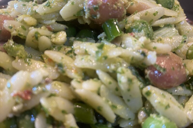 Orzo salad with borlotti beans, peas and arugula pesto