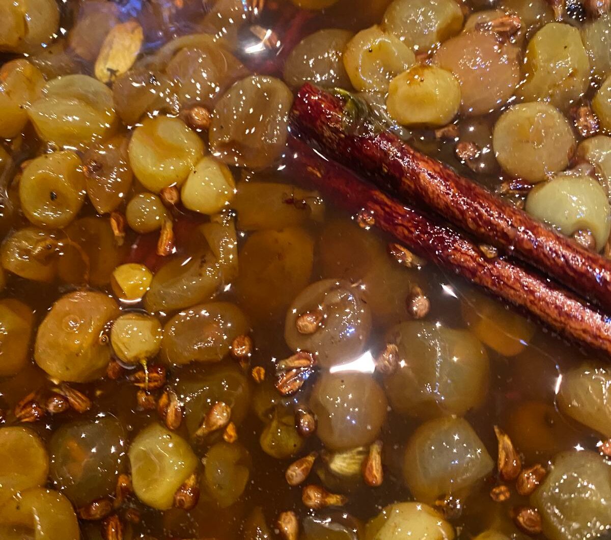 Grapes reduced in cardamom, cinnamon and cane sugar