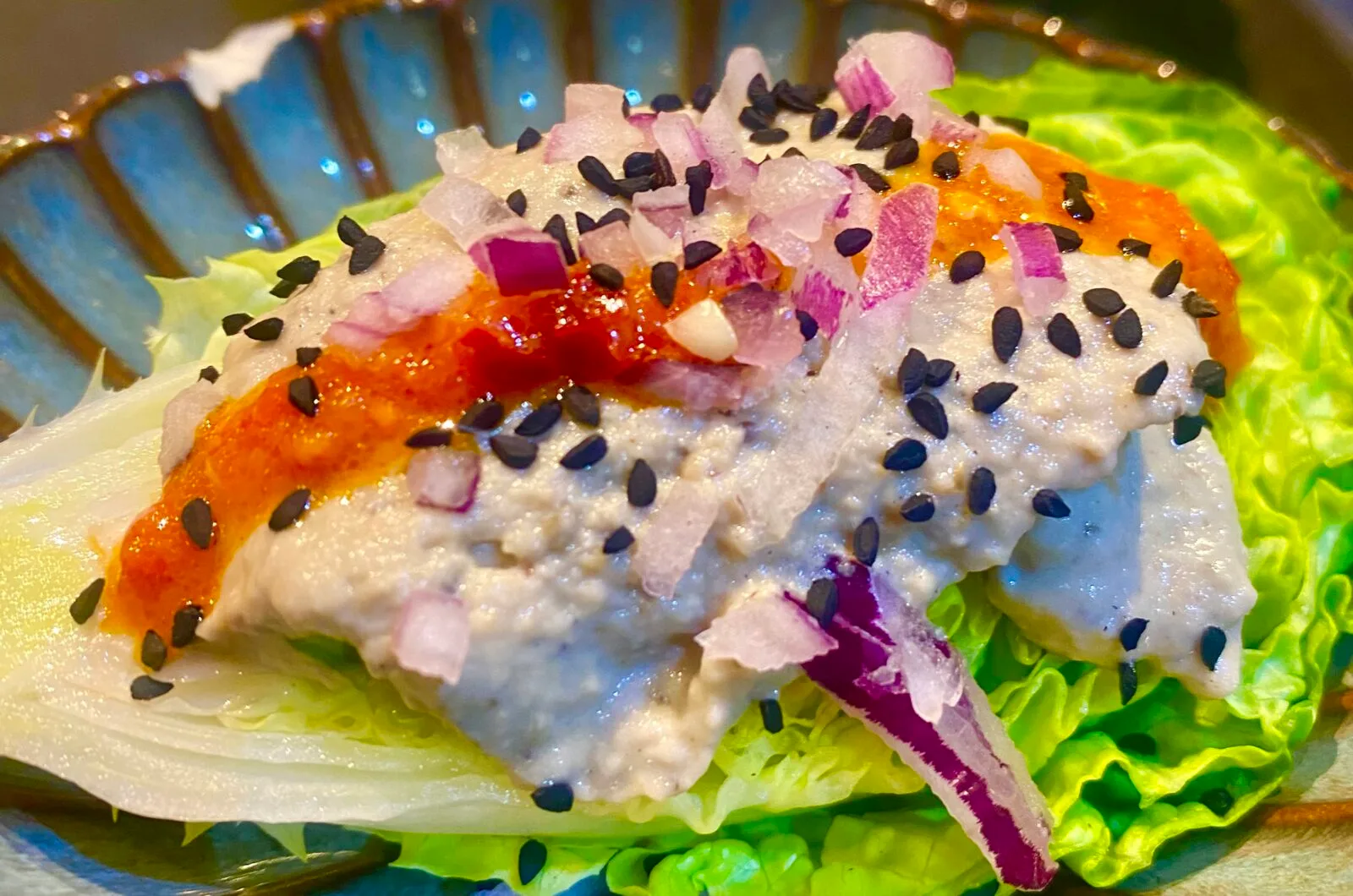 Salad boat with baba ganoush and shatta